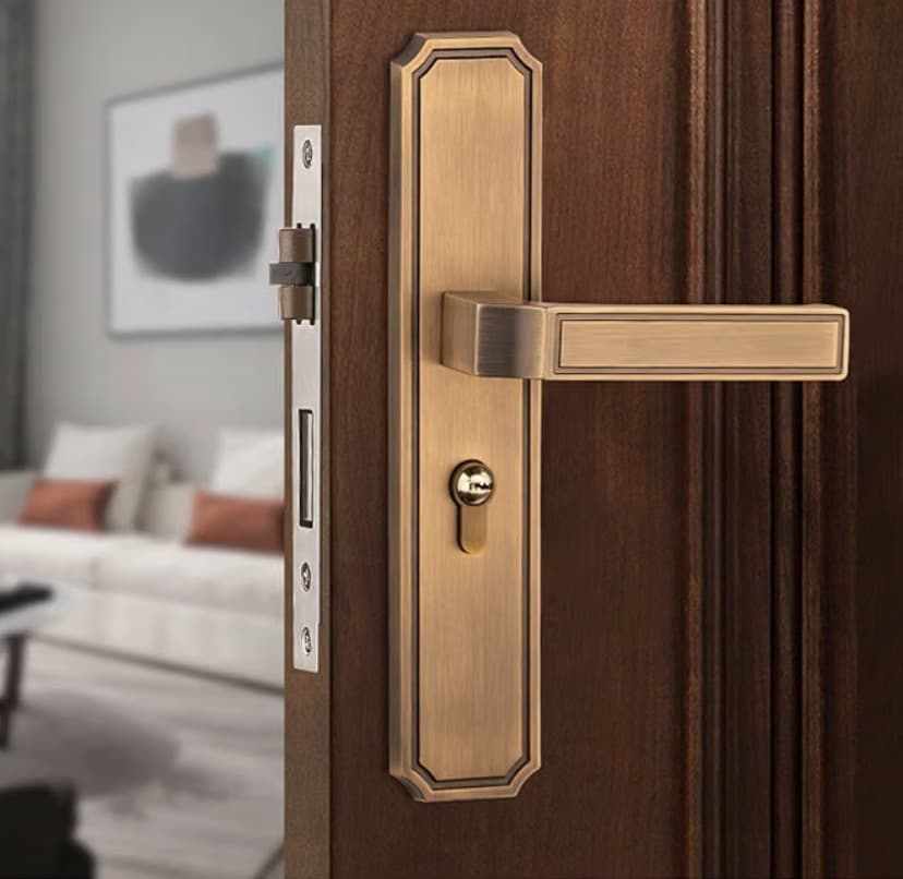 Collection of door levers and cabinet hardware in matched finishes